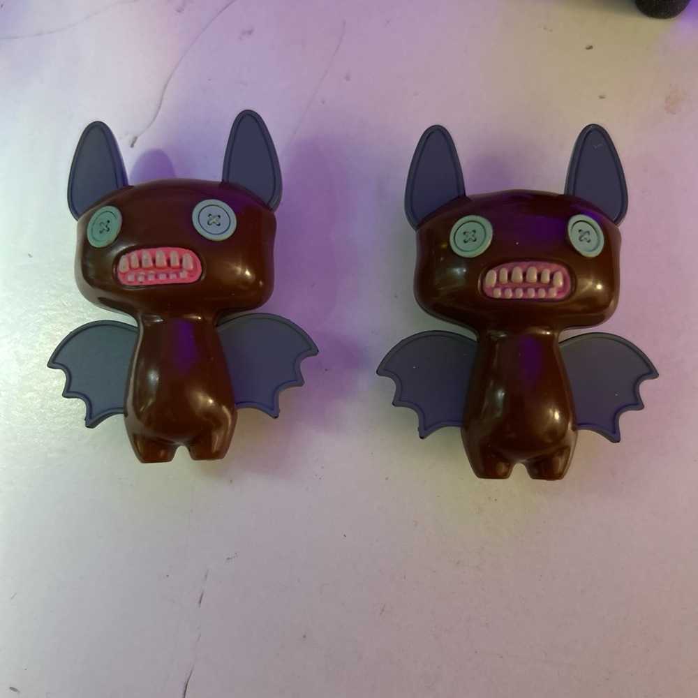 Brown and Blue Bat Toy Figures